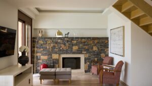 GR Elounda Gulf Deluxe Suite Fireplace Lounge